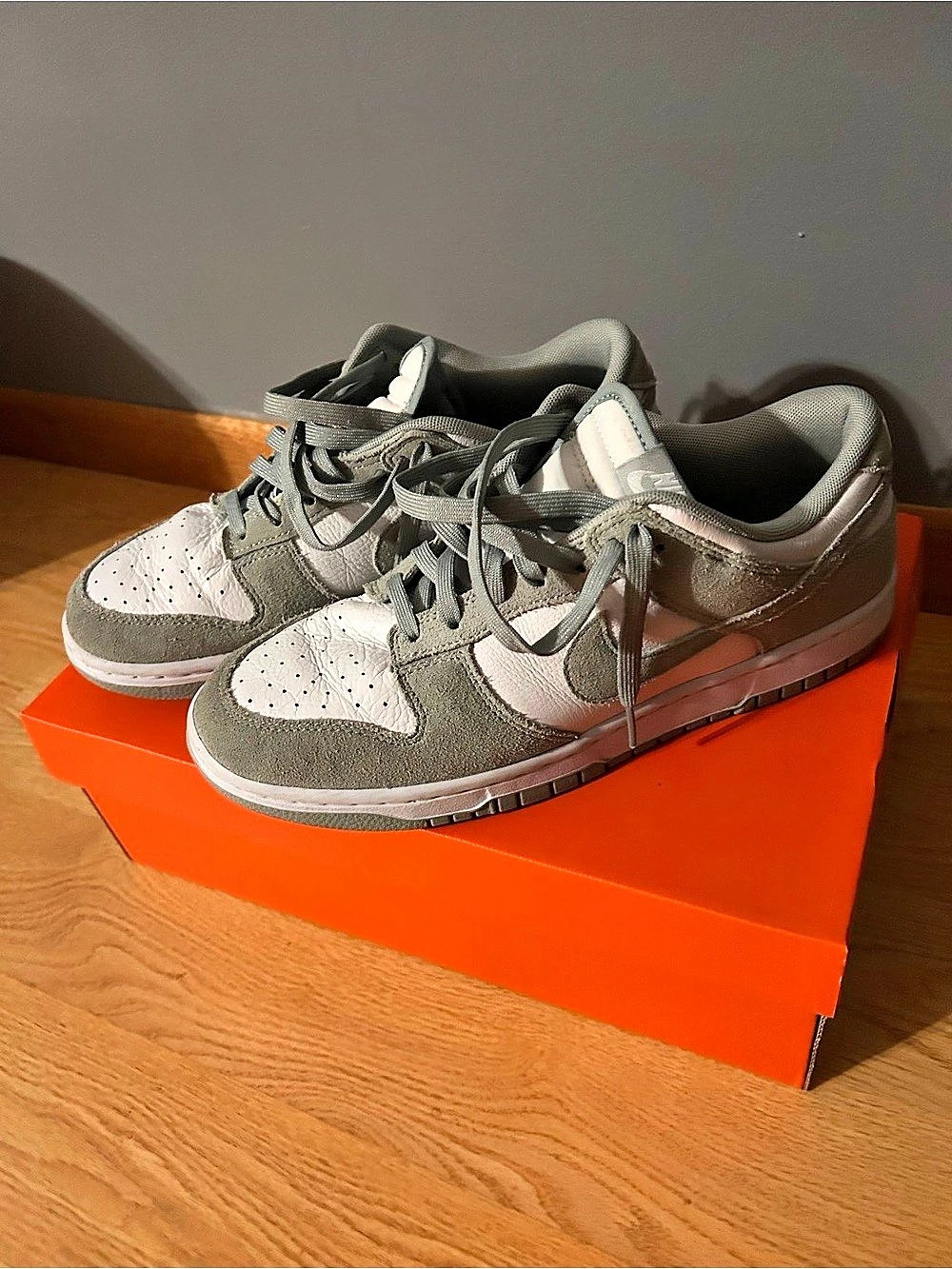 Nike Dunk Low Team Gold Sneakers in Gray & White